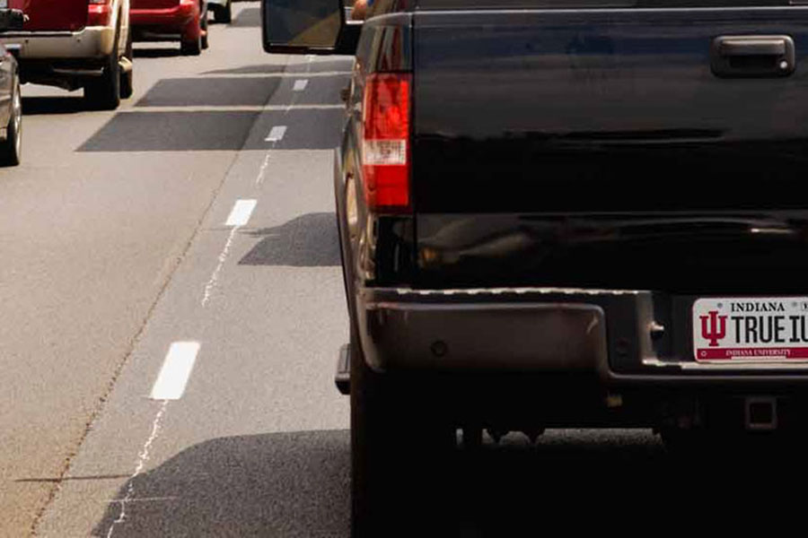back of a pickup truck with an IU license plate
