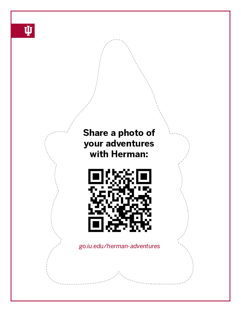Herman the gnome-shaped cutout with QR code for sharing Herman's adventure pictures