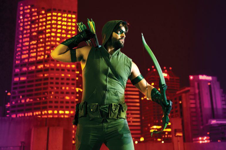 Cosplayer Jake Pierle, BA’14, dressed as the Green Arrow, enjoys creating costumes and props by hand for his costumes. Photo by Marc Lebryk.