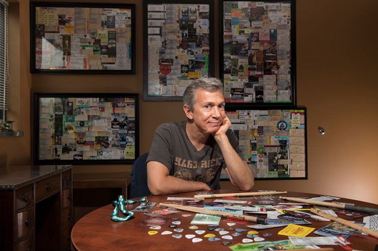 Ross Fazekas keeps all of his ticket stubs together and fills poster-size frames. Once a frame is full, he hangs it on the wall of his office. Fazekas has amassed so many music, comedy, and sports ticket stubs, he is not sure of the exact number. He thinks he has around 1,000 stubs framed. Each one is a happy memory, with its own unique story or experience. Photo by Marc Lebryk.