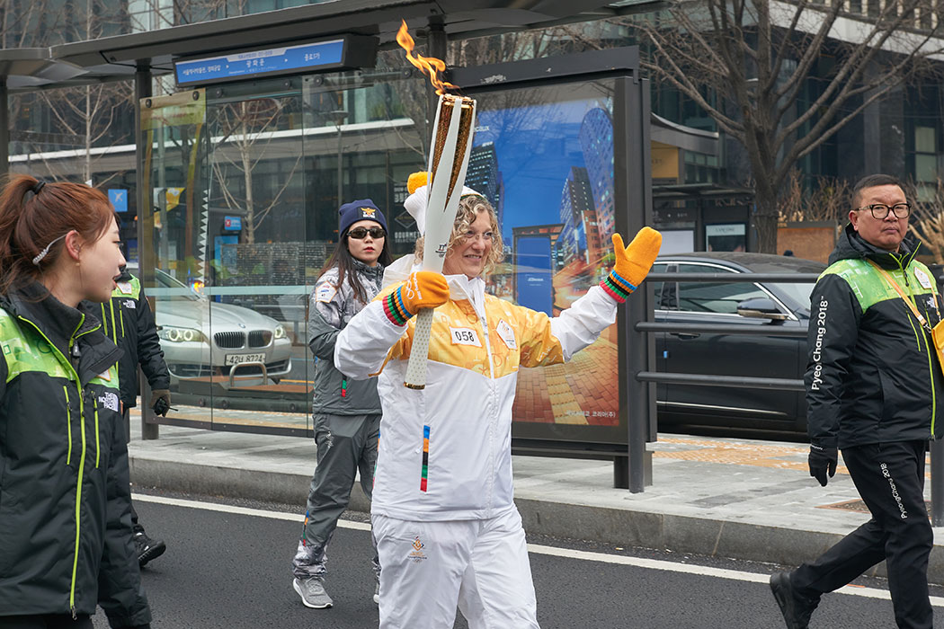 Kesner walking with the flame