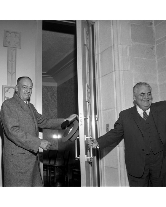 J.K. Lilly and Herman B Wells open the door of the newly dedicated Lilly Library on October 3, 1960.