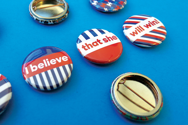 Red, white, and blue buttons that say "I believe that she will win!"