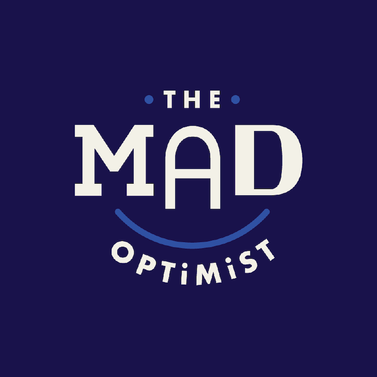 Text that reads: The Mad Optimist