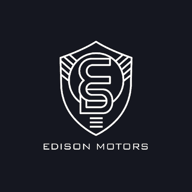 Image of a shield; text that reads: Edison Motors