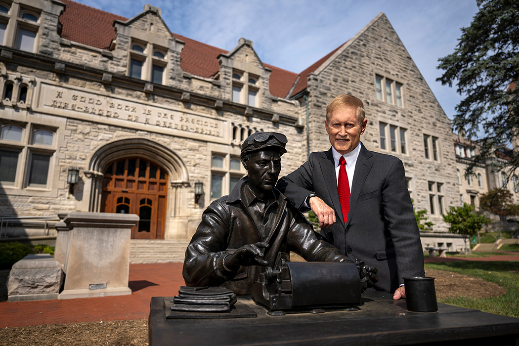 Hofer stands with Ernie Pyle statue