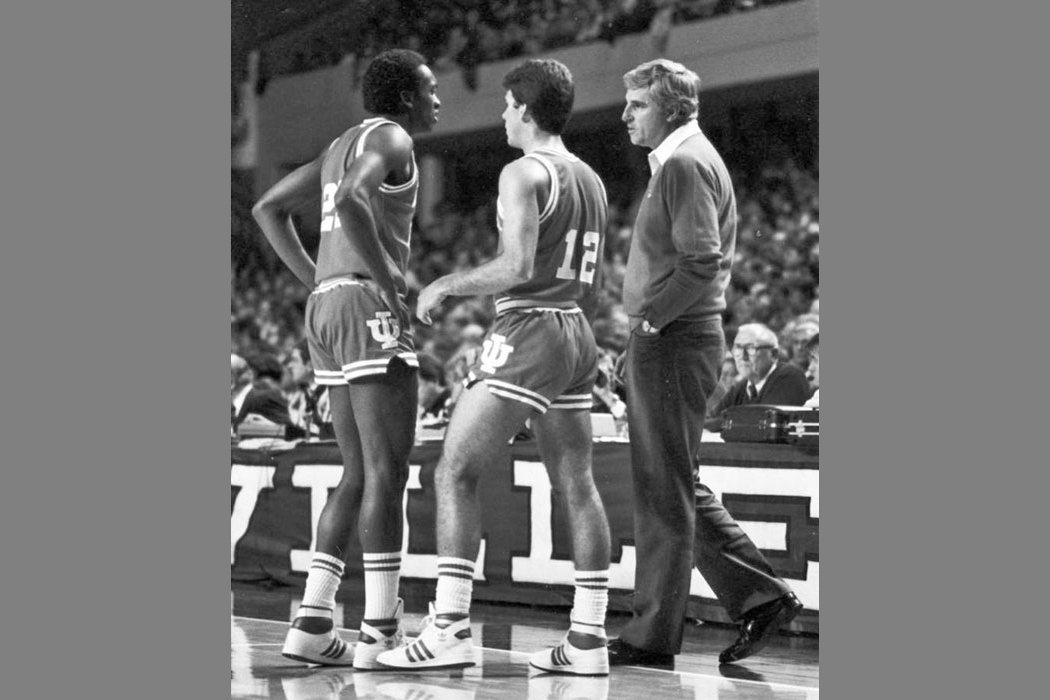 Coach Knight with two players during a game